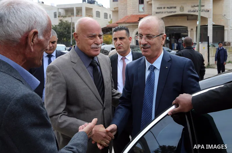 Palestinian Prime Minister Rami Hamdallah visits the NGO Affairs Authority in the West Bank city of Ramallah on November 26, 2018. Photo by Prime Minister Office