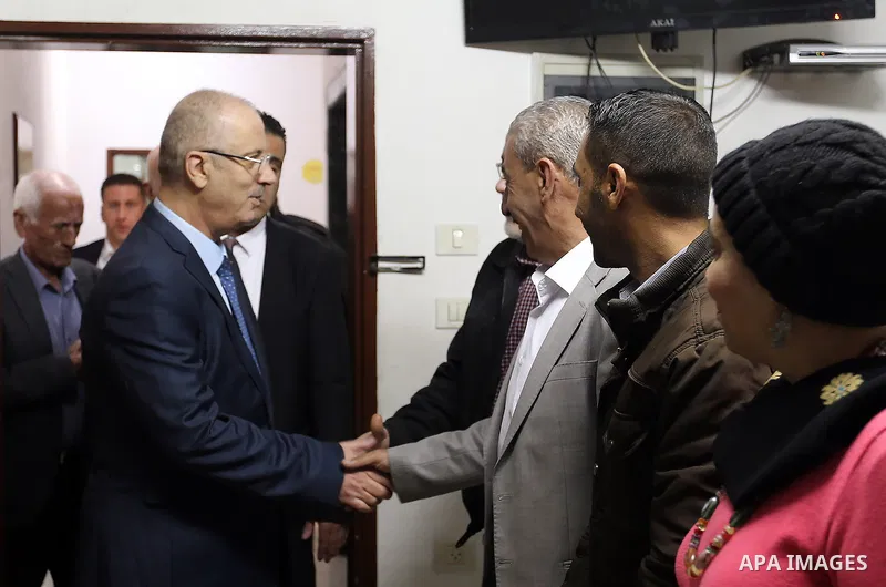Palestinian Prime Minister Rami Hamdallah visits the NGO Affairs Authority in the West Bank city of Ramallah on November 26, 2018. Photo by Prime Minister Office
