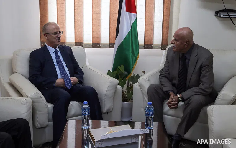Palestinian Prime Minister Rami Hamdallah visits the NGO Affairs Authority in the West Bank city of Ramallah on November 26, 2018. Photo by Prime Minister Office