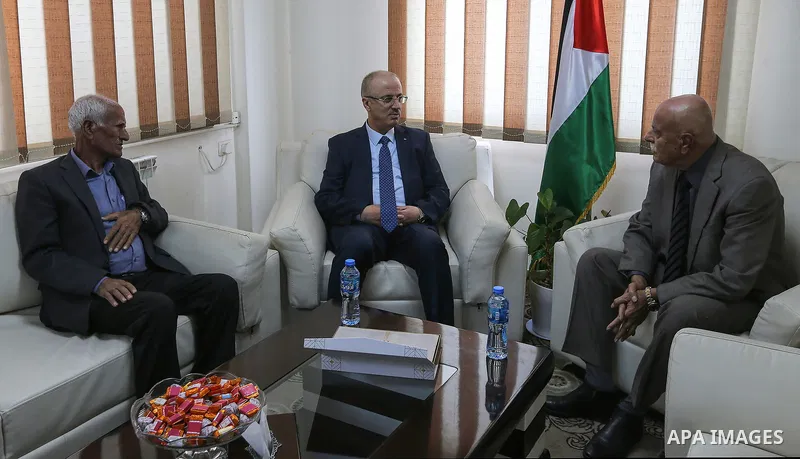 Palestinian Prime Minister Rami Hamdallah visits the NGO Affairs Authority in the West Bank city of Ramallah on November 26, 2018. Photo by Prime Minister Office
