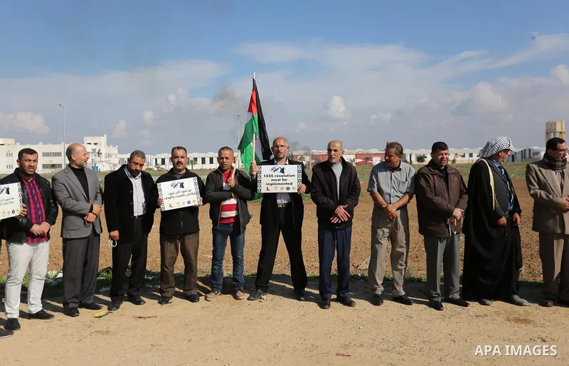 Palestinian women take part during a protest against violence towards women at the Israel-Gaza border, in east of Gaza City on November 26, 2018. Photo by Ashraf Amra