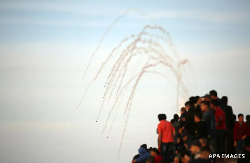 Palestinian protesters gather during clashes with Israeli forces in a demonstration against the Israeli blockade on Gaza Strip, along the Gaza sea barrier on the maritime border with Israel near Kibbutz Zikim, north of B...