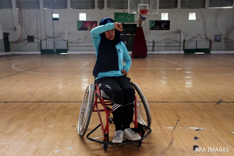 A disabled Palestinian woman on a wheelchair Heda Abu Ouda, 38, takes part in a Karate lesson, at a club in Gaza City on November 27, 2018. Photo by Mahmoud Ajjour