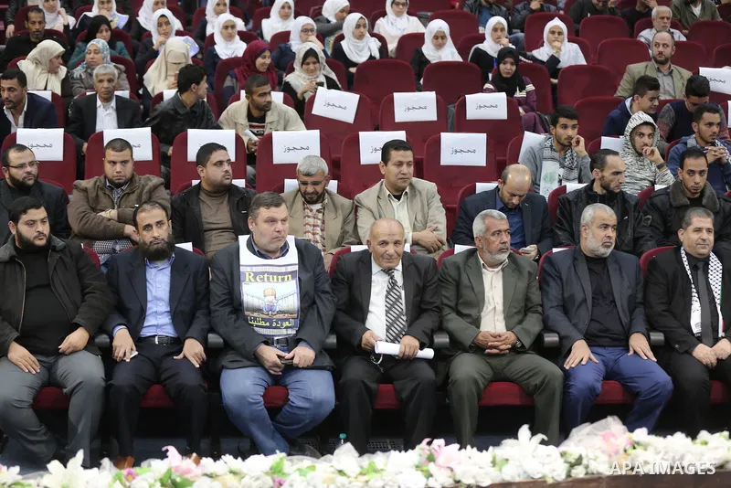Palestinians attend the political symposium, in Gaza city on November 28, 2018. Photo by Ashraf Amra