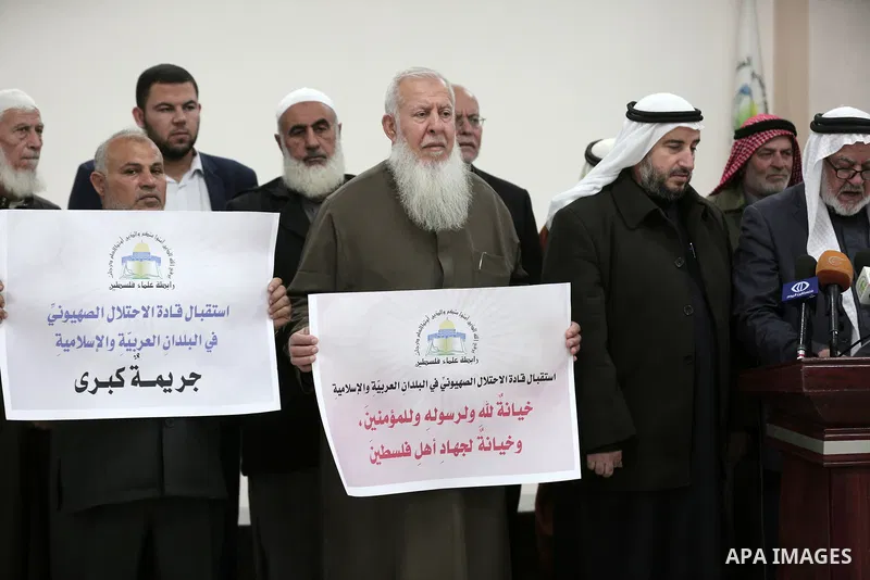 Members of Palestine Scholars Association attend a press conference, in Gaza city on November 28, 2018. Photo by Ashraf Amra
