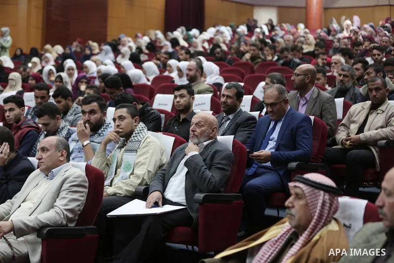 Palestinians attend the political symposium, in Gaza city on November 28, 2018. Photo by Ashraf Amra