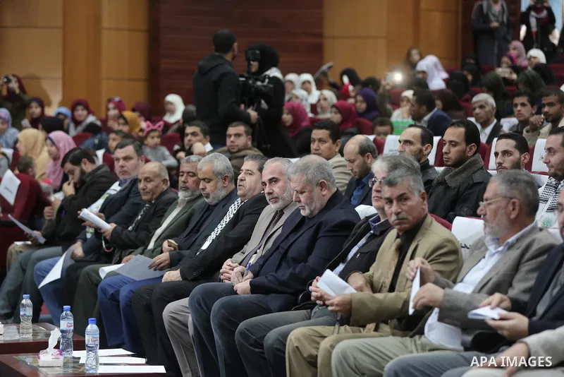Palestinians attend the political symposium, in Gaza city on November 28, 2018. Photo by Ashraf Amra