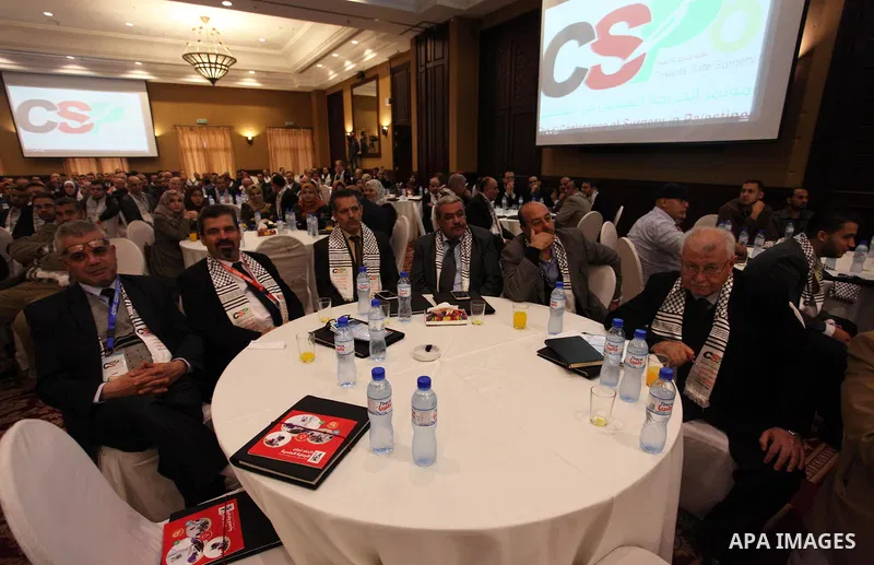 Palestinians attend the 6th Conference of Surgery in Palestine, in Gaza city, on November 29, 2018. Photo by Mahmoud Ajjour