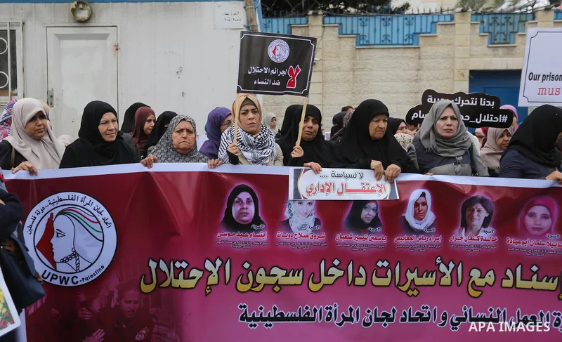 Palestinian supporters of Islamic Jihad movement take part during a protest to show solidarity with Palestinian Prisoners held in Israeli jails, in front of the high commissioner for human rights headquarters, in Gaza ci...