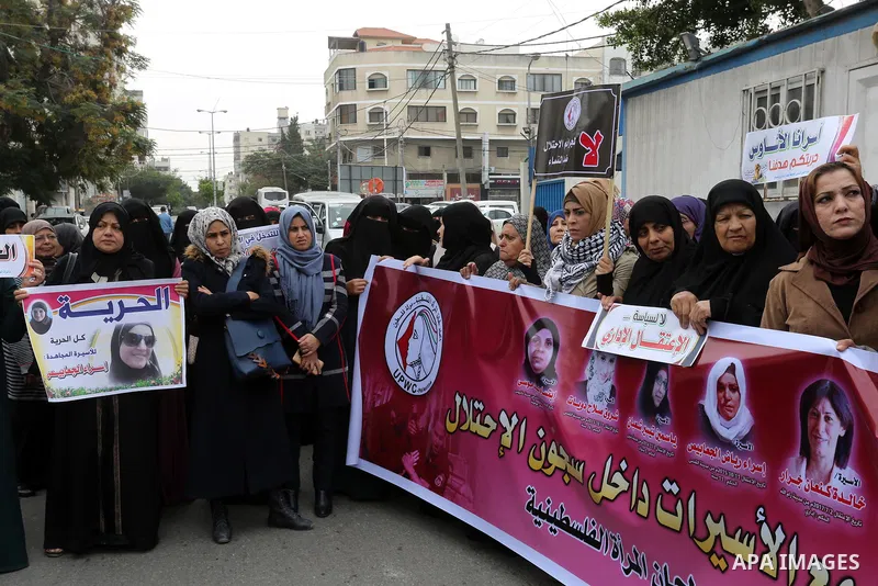 Palestinian supporters of Islamic Jihad movement take part during a protest to show solidarity with Palestinian Prisoners held in Israeli jails, in front of the high commissioner for human rights headquarters, in Gaza ci...
