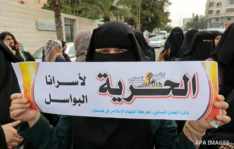 Palestinian supporters of Islamic Jihad movement take part during a protest to show solidarity with Palestinian Prisoners held in Israeli jails, in front of the high commissioner for human rights headquarters, in Gaza ci...