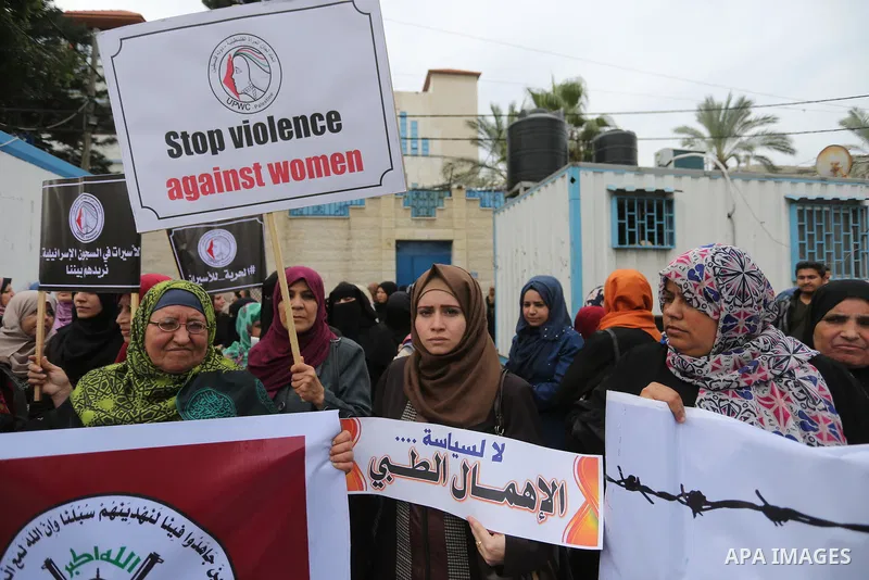 Palestinian supporters of Islamic Jihad movement take part during a protest to show solidarity with Palestinian Prisoners held in Israeli jails, in front of the high commissioner for human rights headquarters, in Gaza ci...