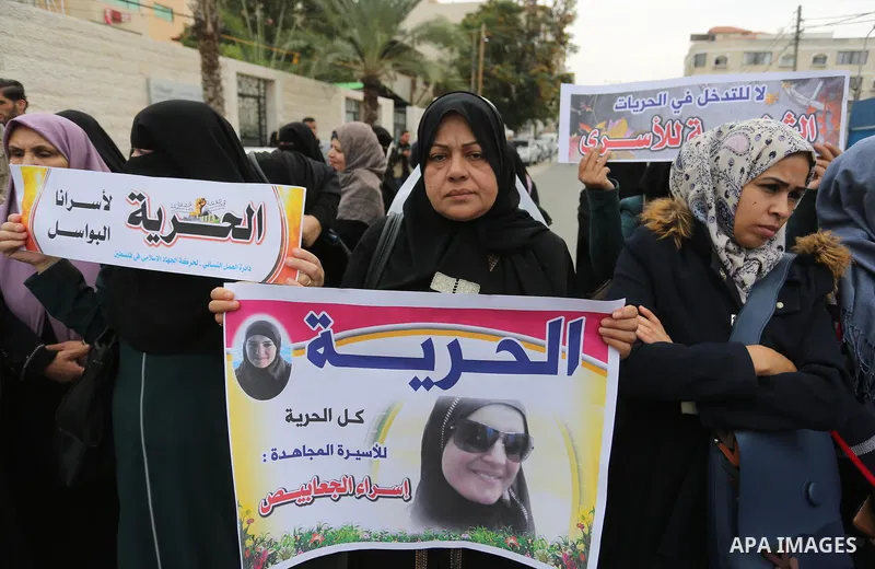 Palestinian supporters of Islamic Jihad movement take part during a protest to show solidarity with Palestinian Prisoners held in Israeli jails, in front of the high commissioner for human rights headquarters, in Gaza ci...