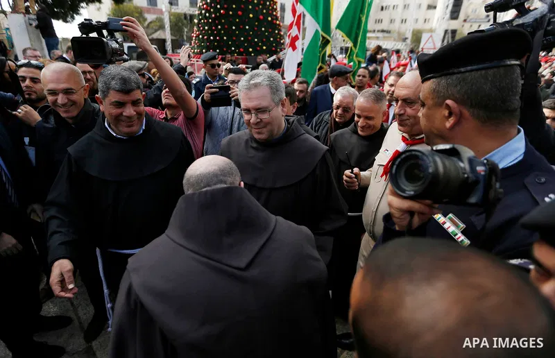 Custodian of the Holy Land Father Francesco Patton arrives to lead a mass at the Church of Nativity, in the West Bank city of Bethlehem on December 1, 2018. Photo by Wisam Hashlamoun