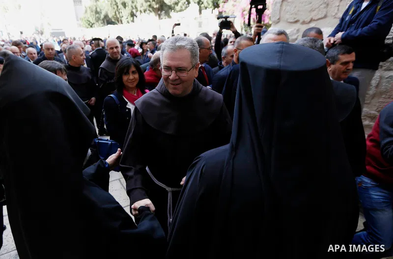 Custodian of the Holy Land Father Francesco Patton arrives to lead a mass at the Church of Nativity, in the West Bank city of Bethlehem on December 1, 2018. Photo by Wisam Hashlamoun