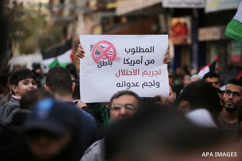 Palestinians attend a rally against a US-drafted resolution that would condemn Palestinian resistance movement Hamas for firing rockets in Gaza city, on December 6, 2018. Photo by Dawod Abu Kass