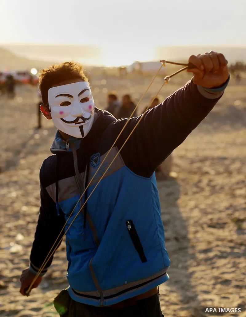 Palestinian protesters gather during clashes with Israeli forces in a demonstration against the Israeli blockade on Gaza Strip, along the Gaza sea barrier on the maritime border with Israel near Kibbutz Zikim, north of B...