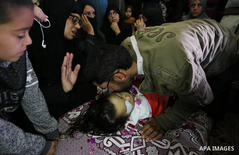 Relatives of Palestinian boy Ahmed Abu abed, 5, who was died of his wounds which he sustained by Israeli forces during clashes in tents protest where Palestinians demand the right to return to their homeland at the Israe...