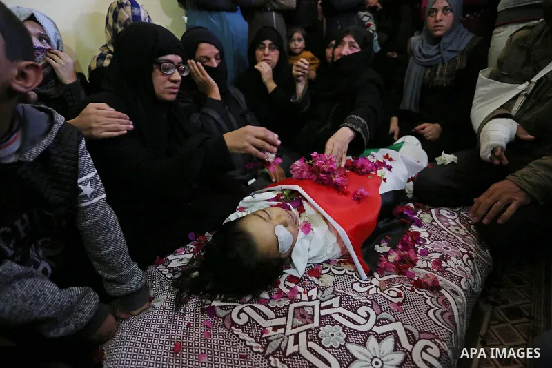 Relatives of Palestinian boy Ahmed Abu abed, 5, who was died of his wounds which he sustained by Israeli forces during clashes in tents protest where Palestinians demand the right to return to their homeland at the Israe...