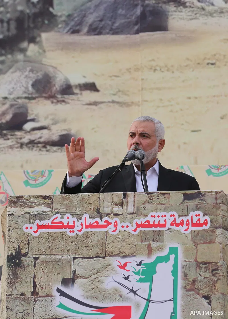 Chairman of the political bureau of the Hamas Palestinian Islamist movement, Ismail Haniyeh speaks during a rally marking the 31th anniversary of the founding of the Hamas movement, in Gaza city, December 16, 2018. Photo...