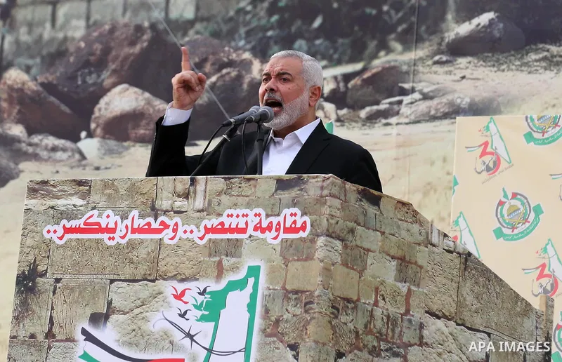 Chairman of the political bureau of the Hamas Palestinian Islamist movement, Ismail Haniyeh speaks during a rally marking the 31th anniversary of the founding of the Hamas movement, in Gaza city, December 16, 2018. Photo...