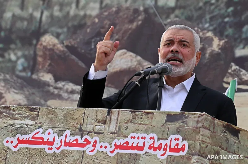 Chairman of the political bureau of the Hamas Palestinian Islamist movement, Ismail Haniyeh speaks during a rally marking the 31th anniversary of the founding of the Hamas movement, in Gaza city, December 16, 2018. Photo...