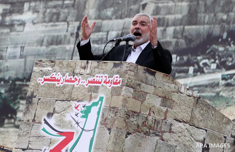Chairman of the political bureau of the Hamas Palestinian Islamist movement, Ismail Haniyeh speaks during a rally marking the 31th anniversary of the founding of the Hamas movement, in Gaza city, December 16, 2018. Photo...