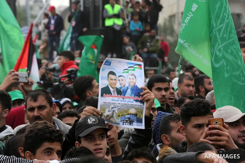 Palestinian Hamas supporters attend a rally marking the 31th anniversary of the founding of the Hamas movement, in Gaza city, December 16, 2018. Photo by Ashraf Amra