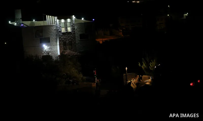An excavator of the Israeli forces destroys the house of Palestinian man Ashraf Naalwa in the village of Shuwaykah, near the West Bank city of Tulkarem, on December 17, 2018. - Ashraf Naalwa was killed on December 12 by...