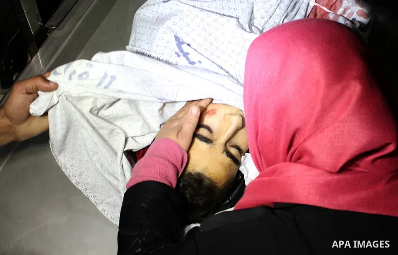 Relatives of Palestinian youth Mohammed Jahjouh, 16, who was shot dead by Israeli forces during clashes with Israeli troops in tents protest where Palestinians demand the right to return to their homeland at the Israel-G...