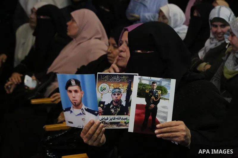 Palestinians attend the celebration of the National Day of Martyrs of the Ministry of Interior and National Security marking the 10th anniversary of the Israel-Gaza war, in Gaza City, on December 27, 2018. Photo by Ashra...