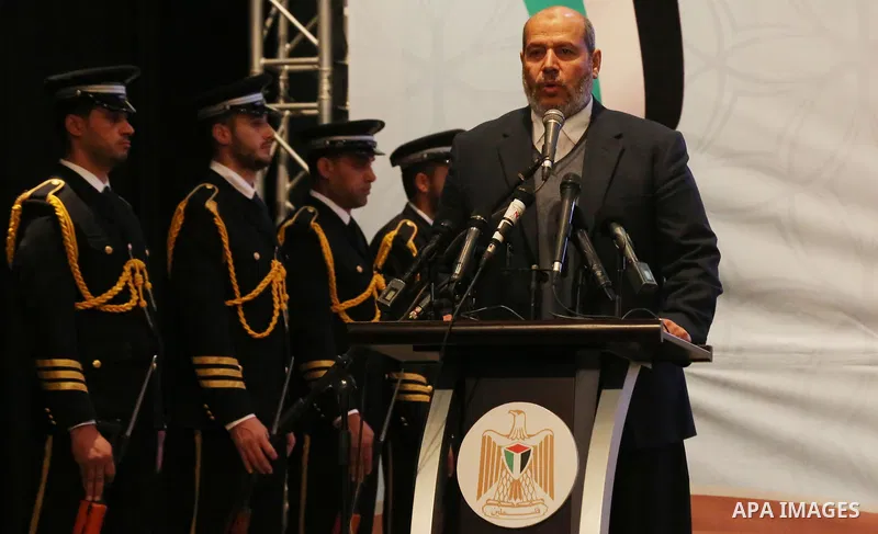 Senior Hamas leader Khalil al-Hayah speaks during the celebration of the National Day of Martyrs of the Ministry of Interior and National Security marking the 10th anniversary of the Israel-Gaza war, in Gaza City, on Dec...