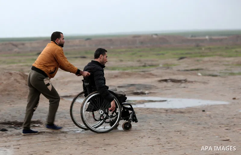 Palestinian protesters gather during a protest where Palestinians demand the right to return to their homeland at the Israel-Gaza border, in east of Gaza City on December 28, 2018. Photo by Ramadan Elagha