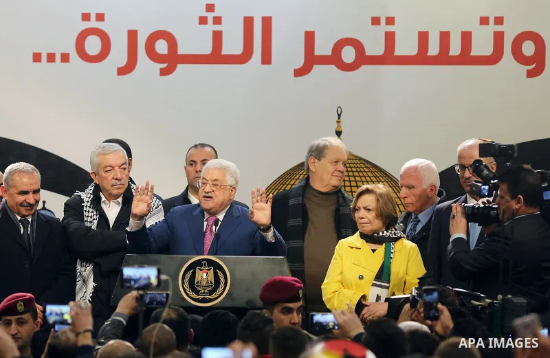 Palestinian President Mahmoud Abbas speaks during a ceremony marking the 54th anniversary of Fatah's founding, in the West Bank city of Ramallah, on December 31, 2018. Photo by Ahmad Arouri