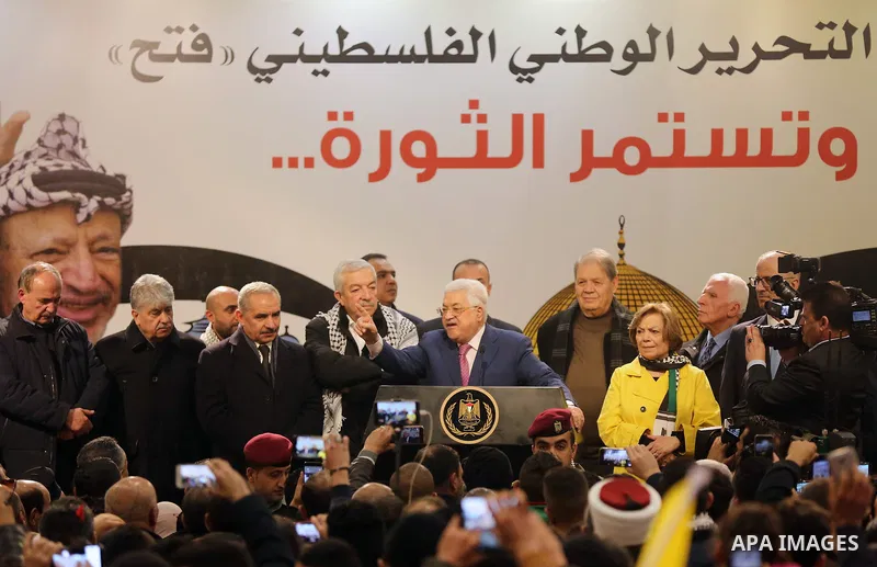Palestinian President Mahmoud Abbas speaks during a ceremony marking the 54th anniversary of Fatah's founding, in the West Bank city of Ramallah, on December 31, 2018. Photo by Ahmad Arouri