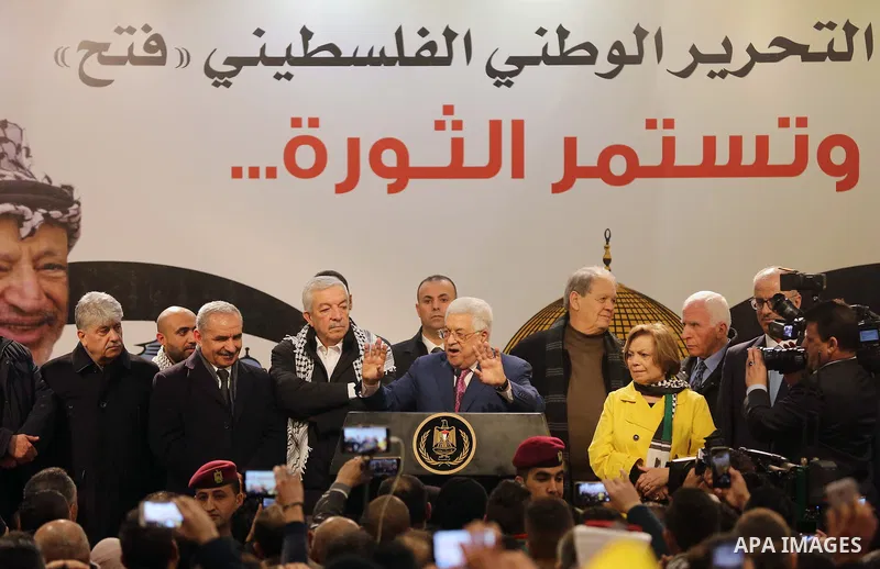 Palestinian President Mahmoud Abbas speaks during a ceremony marking the 54th anniversary of Fatah's founding, in the West Bank city of Ramallah, on December 31, 2018. Photo by Ahmad Arouri