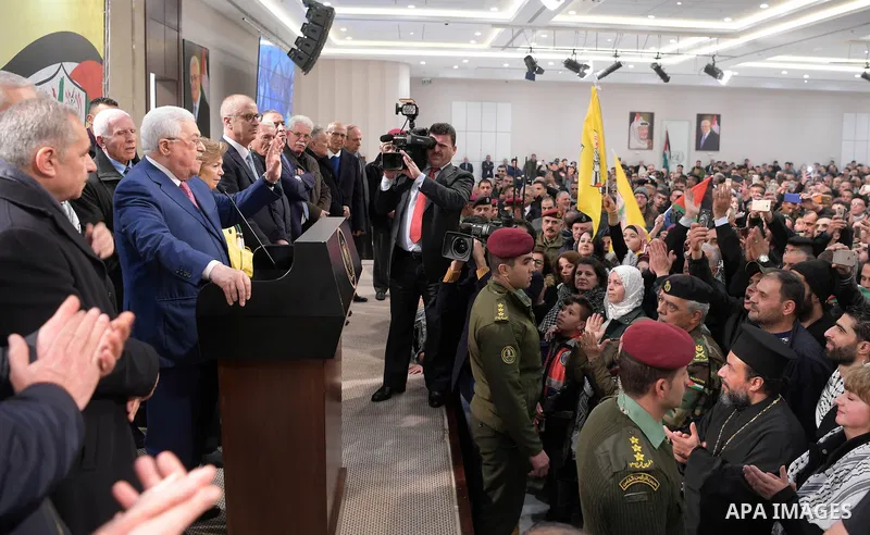 Palestinian President Mahmoud Abbas speaks during a ceremony marking the 54th anniversary of Fatah's founding, in the West Bank city of Ramallah, on December 31, 2018. Photo by Thaer Ganaim