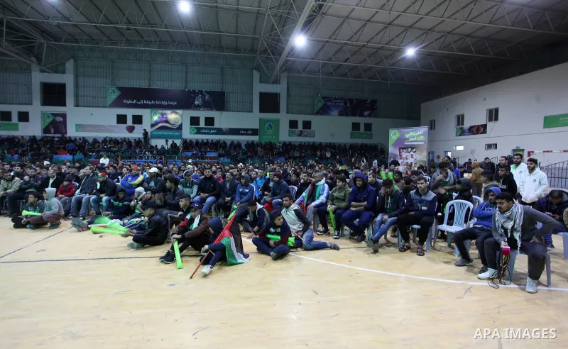 Palestinian fans watch the 2019 AFC Asian Cup Group B football between Palestine and Syria, in Gaza city on January 06, 2019. The match ended in a 0-0 draw. Photo by Mahmoud Ajjour