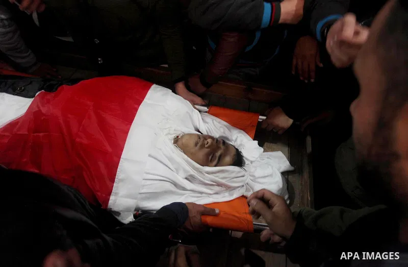 Relatves of Palestinian Hamza Ishtawi, 18, who was shot dead by Israeli forces during clashes with Israeli troops in tents protest where Palestinians demand the right to return to their homeland at the Israel-Gaza border...
