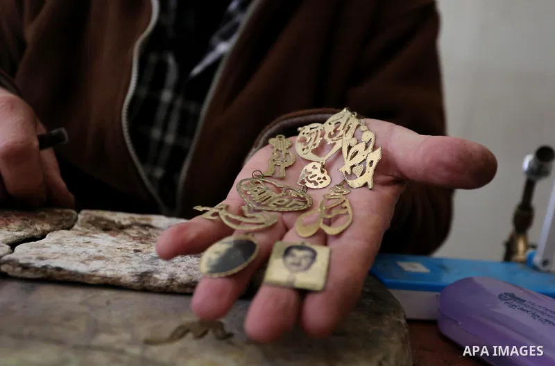A Palestnian goldsmith Nicolae Terzi, 62, makes jewellery at his workshop, in Khan Younis in the southern of Gaza strip, on February 14, 2019. Terzi has jewellery-making skills as he trained in the profession in Italy si...