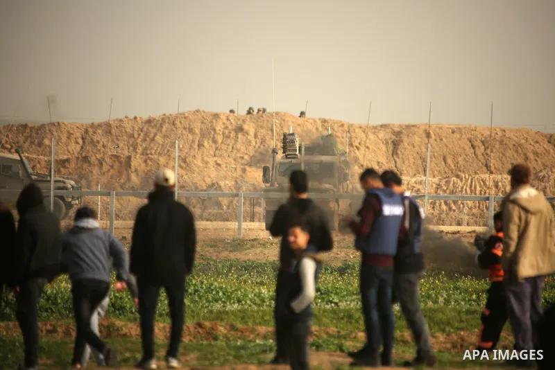 Palestinian protesters clash with Israeli troops following the tents protest where Palestinians demand the right to return to their homeland at the Israel-Gaza border, in the east of Gaza city, February 15, 2019. At leas...