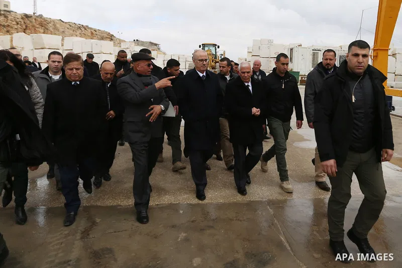 Palestinian Prime Minister Rami Hamdallah visits a stone factory in the West Bank village of Bani Naem, February 16 2019. Hamdallah's tour included visits to stone quarries and factories in the West Bank villages of Bani...