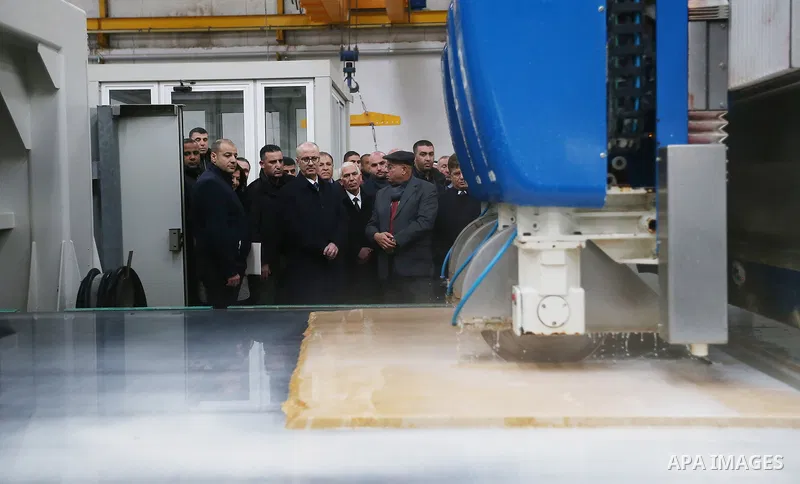 Palestinian Prime Minister Rami Hamdallah visits a stone factory in the West Bank village of Bani Naem, February 16 2019. Hamdallah's tour included visits to stone quarries and factories in the West Bank villages of Bani...