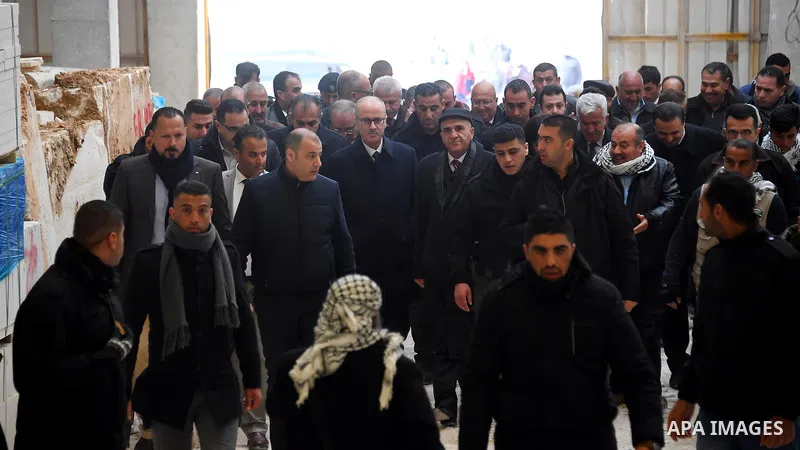 Palestinian Prime Minister Rami Hamdallah visits a stone factory in the West Bank village of Bani Naem, February 16 2019. Hamdallah's tour included visits to stone quarries and factories in the West Bank villages of Bani...