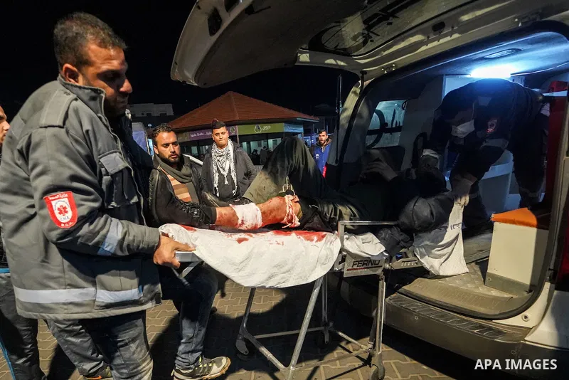 A wounded Palestinian protester, who was injured by Israeli security forces at the Gaza-Israel border, arrives at the emergency department, at the Al-Shifa hospital in Gaza city on February 18, 2019. Hundreds of Palestin...