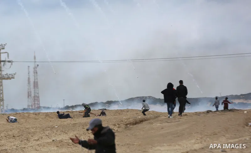 Palestinian demonstrators protest on the beach along the northern Gaza border, across from the Israeli settlement of Kibbutz Zikim, on February 19, 2019, as part of weekly maritime protests against the naval blockade of...