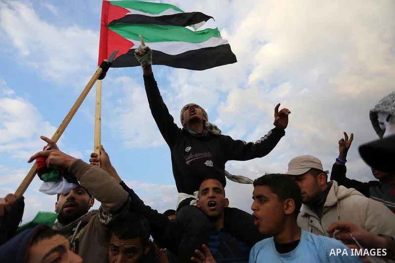 Palestinian demonstrators protest on the beach along the northern Gaza border, across from the Israeli settlement of Kibbutz Zikim, on February 19, 2019, as part of weekly maritime protests against the naval blockade of...