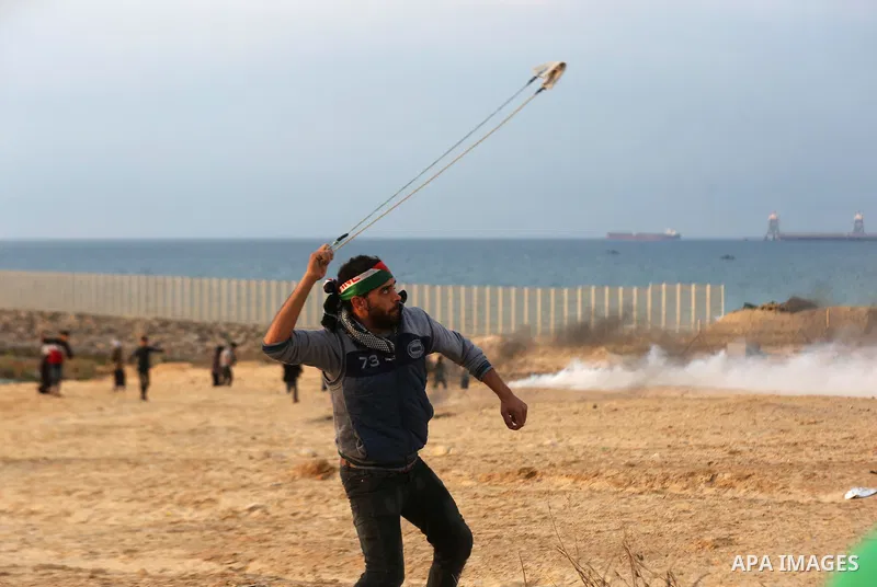 Palestinian demonstrators protest on the beach along the northern Gaza border, across from the Israeli settlement of Kibbutz Zikim, on February 19, 2019, as part of weekly maritime protests against the naval blockade of...