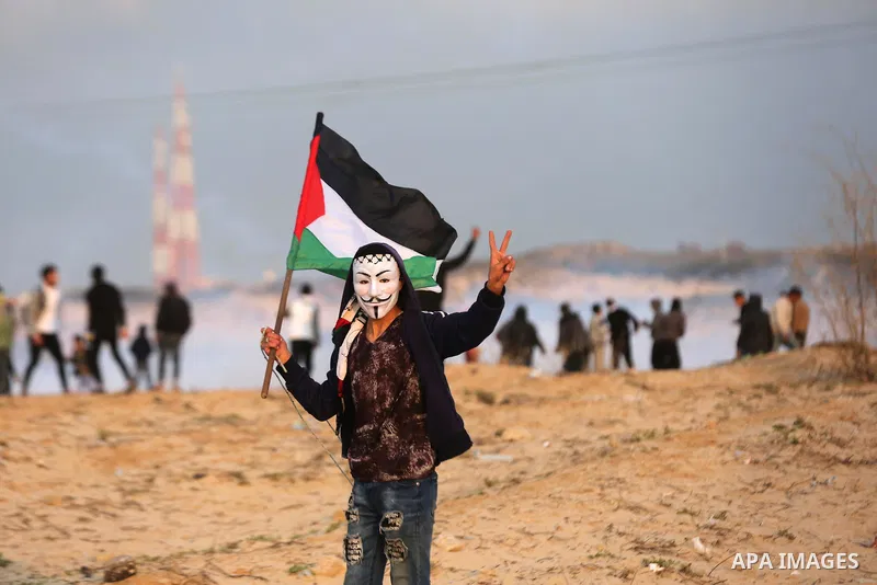 Palestinian demonstrators protest on the beach along the northern Gaza border, across from the Israeli settlement of Kibbutz Zikim, on February 19, 2019, as part of weekly maritime protests against the naval blockade of...