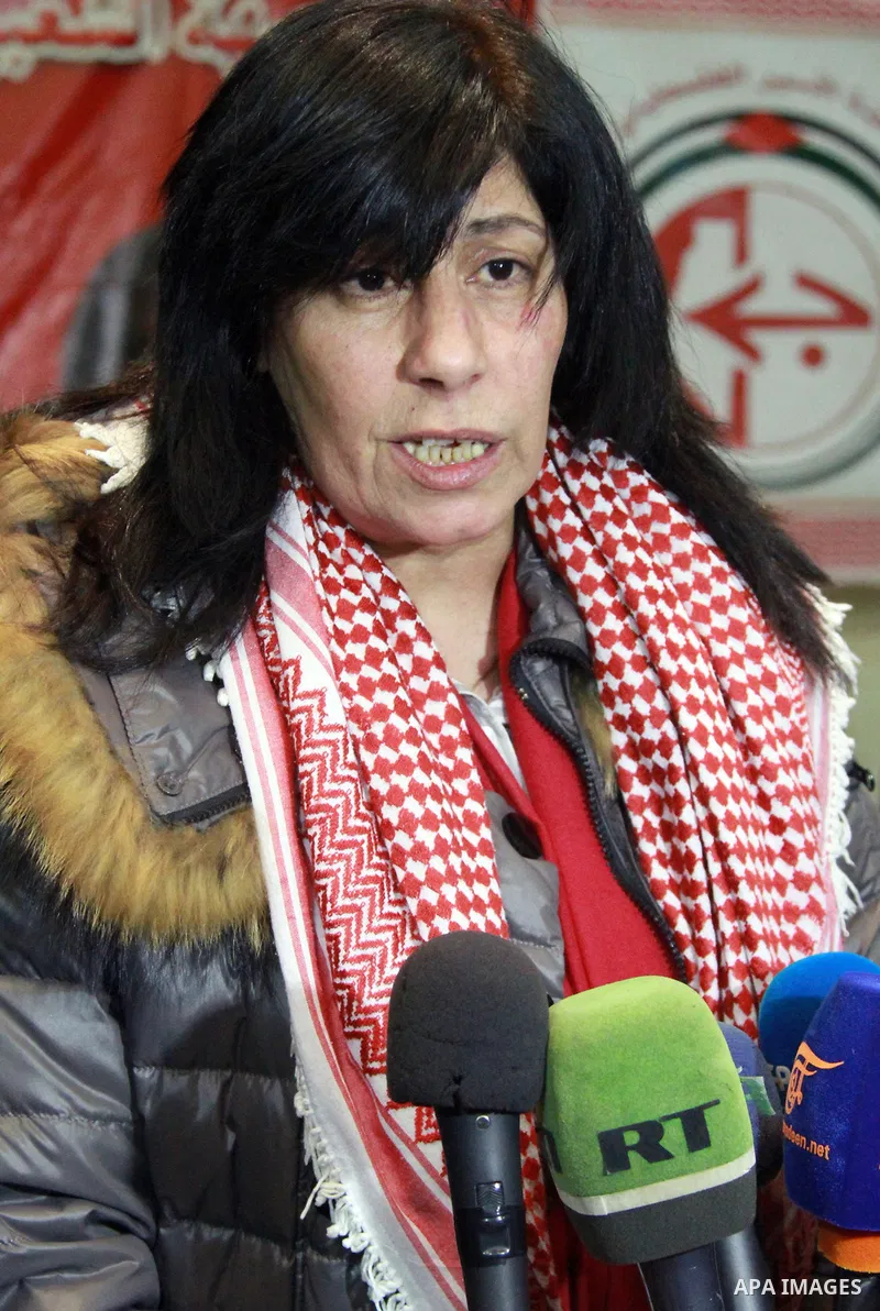 Popular Front for the Liberation of Palestine (PFLP) member Khalida Jarrar, 56, hugs a supporter, following her release from an Israeli jail, in the occupied West Bank city of Ramallah, on February 28, 2019. Israel relea...